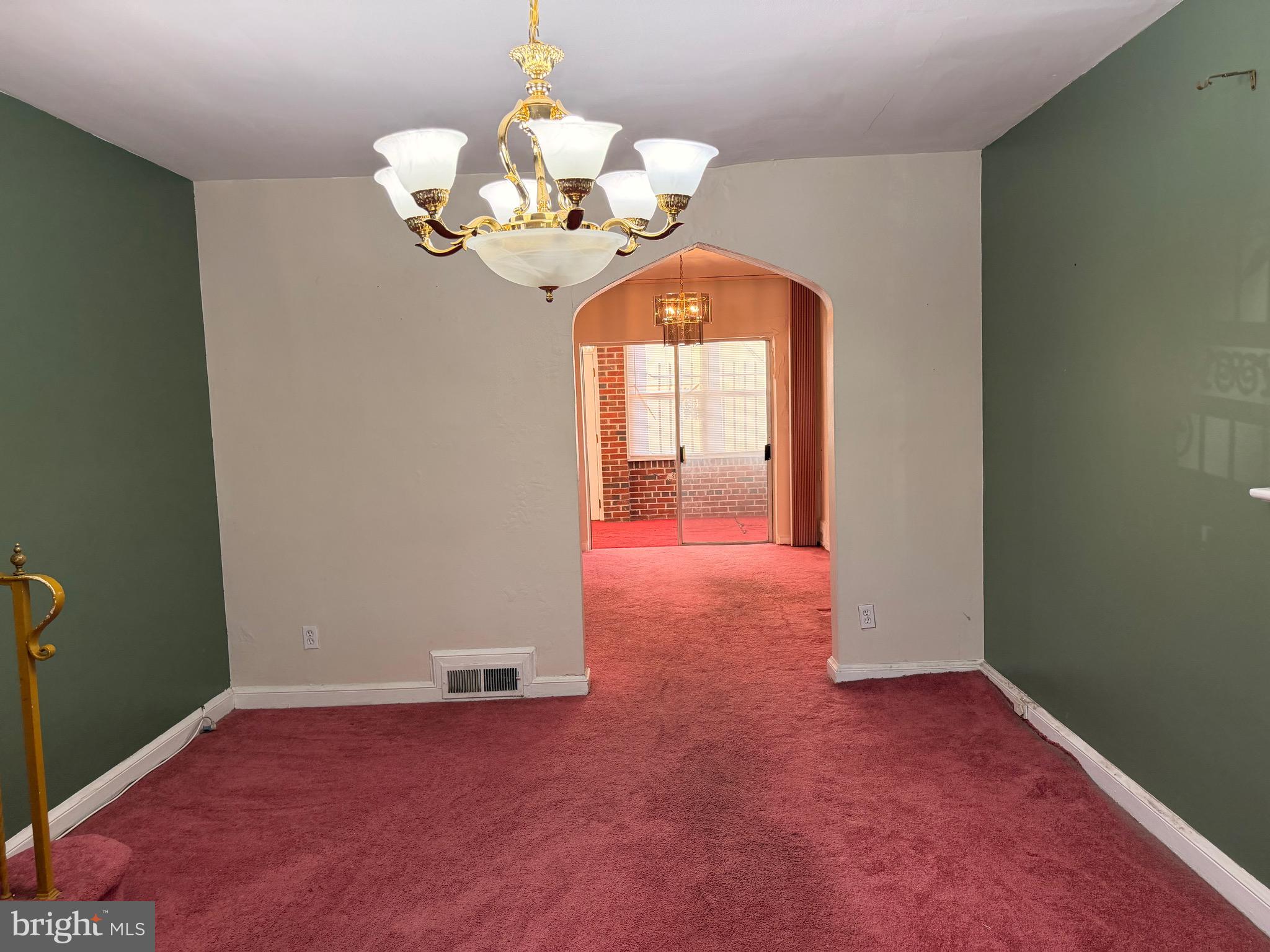1001 30th Street Southeast Washington, DC 20019 - Photo 5 of 40 a view of a livingroom with a chandelier