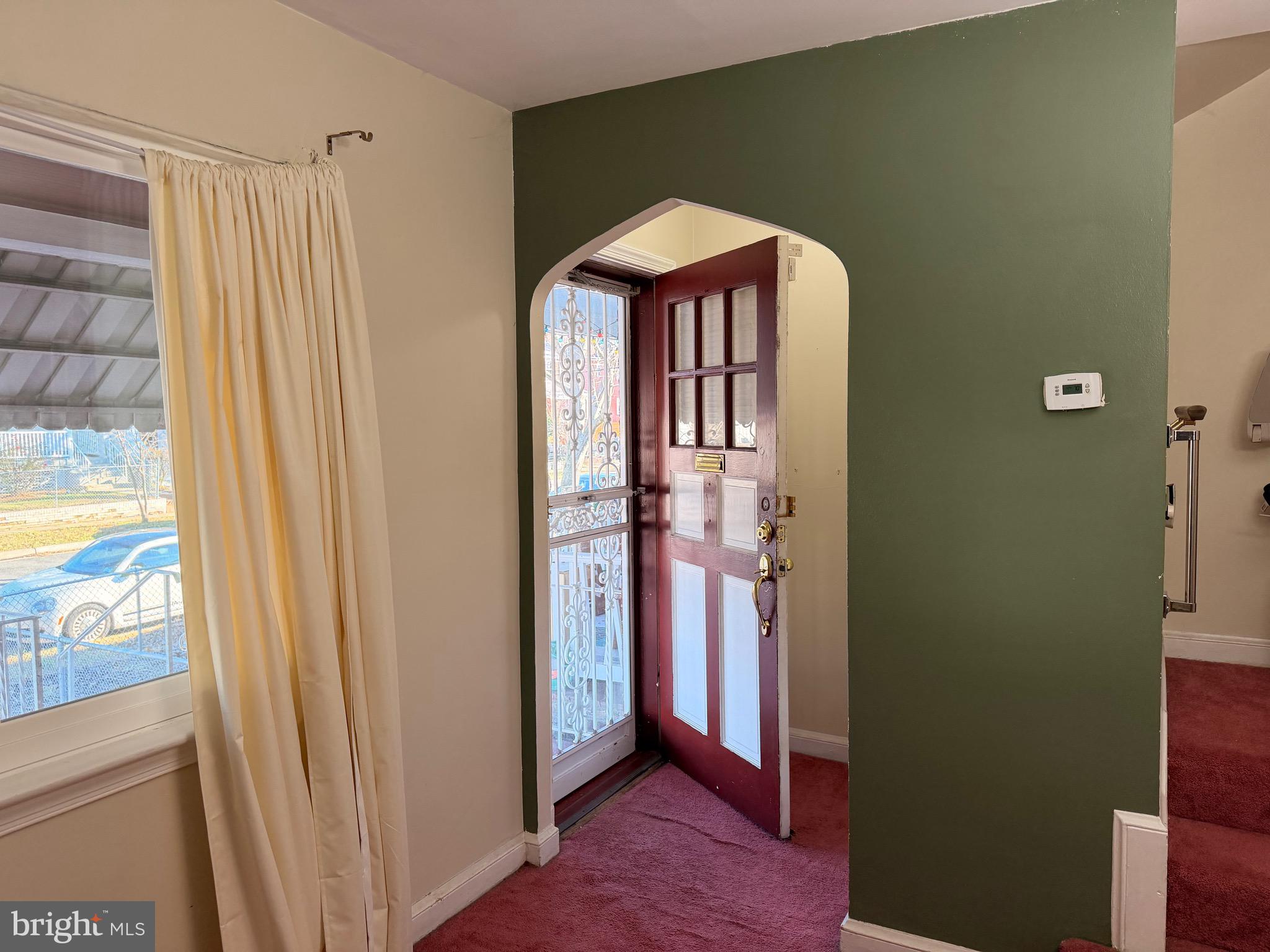 1001 30th Street Southeast Washington, DC 20019 - Photo 6 of 40 a bedroom with a bed and a window