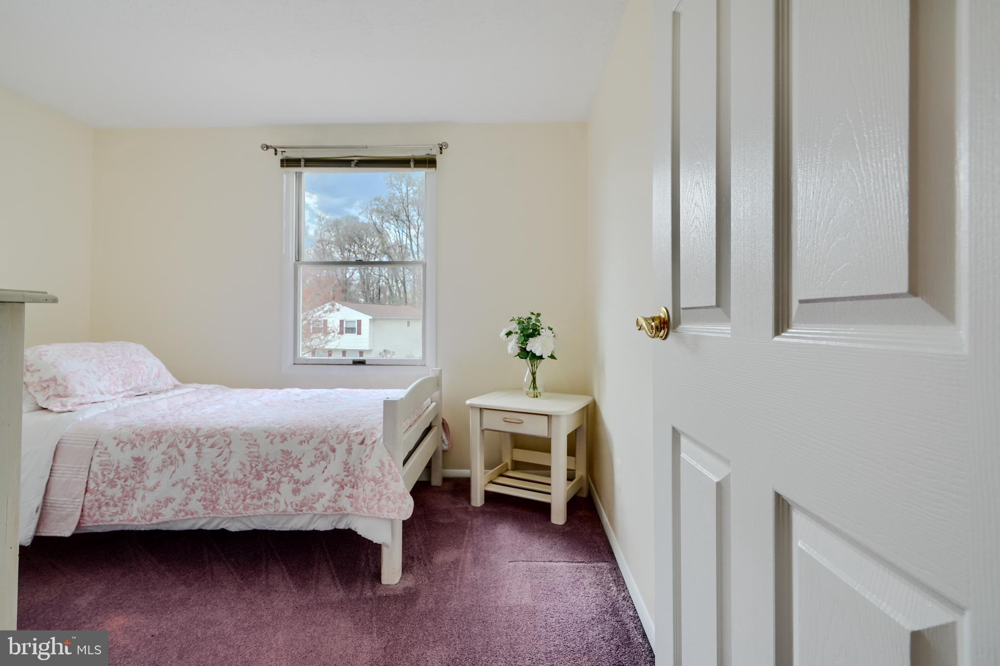 19 Yew Road Baltimore, MD 21221 - Photo 18 of 36 a bedroom with a bed and a window