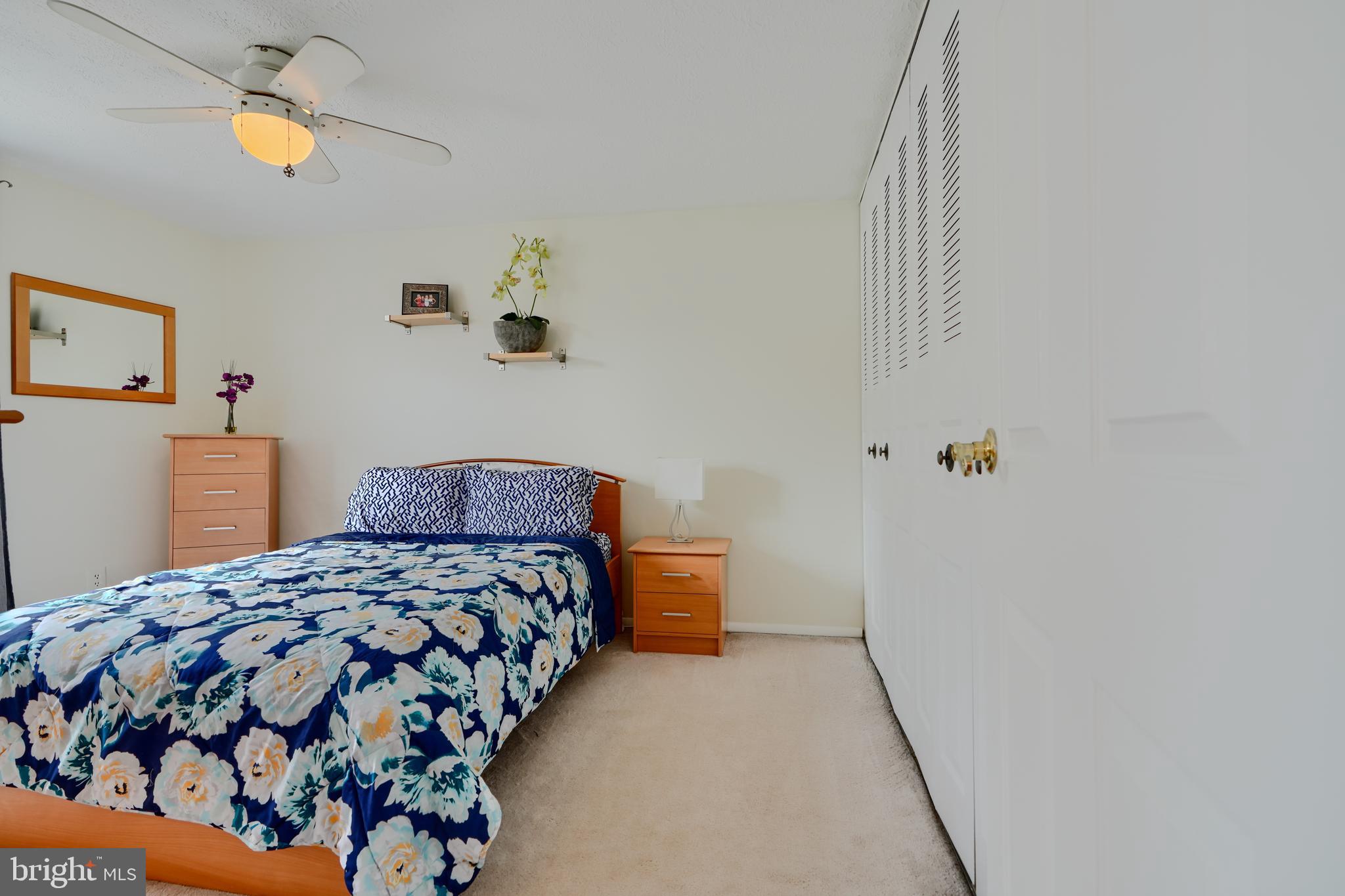 19 Yew Road Baltimore, MD 21221 - Photo 20 of 36 a bedroom with a bed and a chandelier