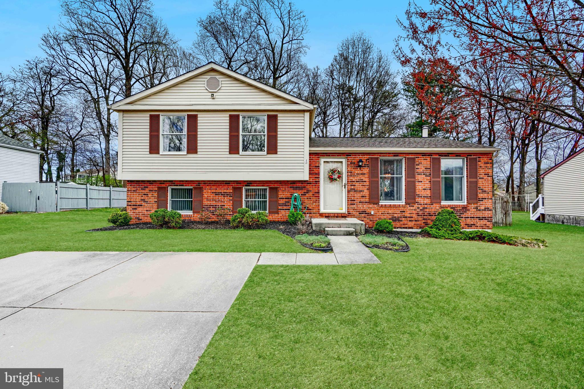 19 Yew Road Baltimore, MD 21221 - Photo 2 of 36 a front view of a house with a yard and trees