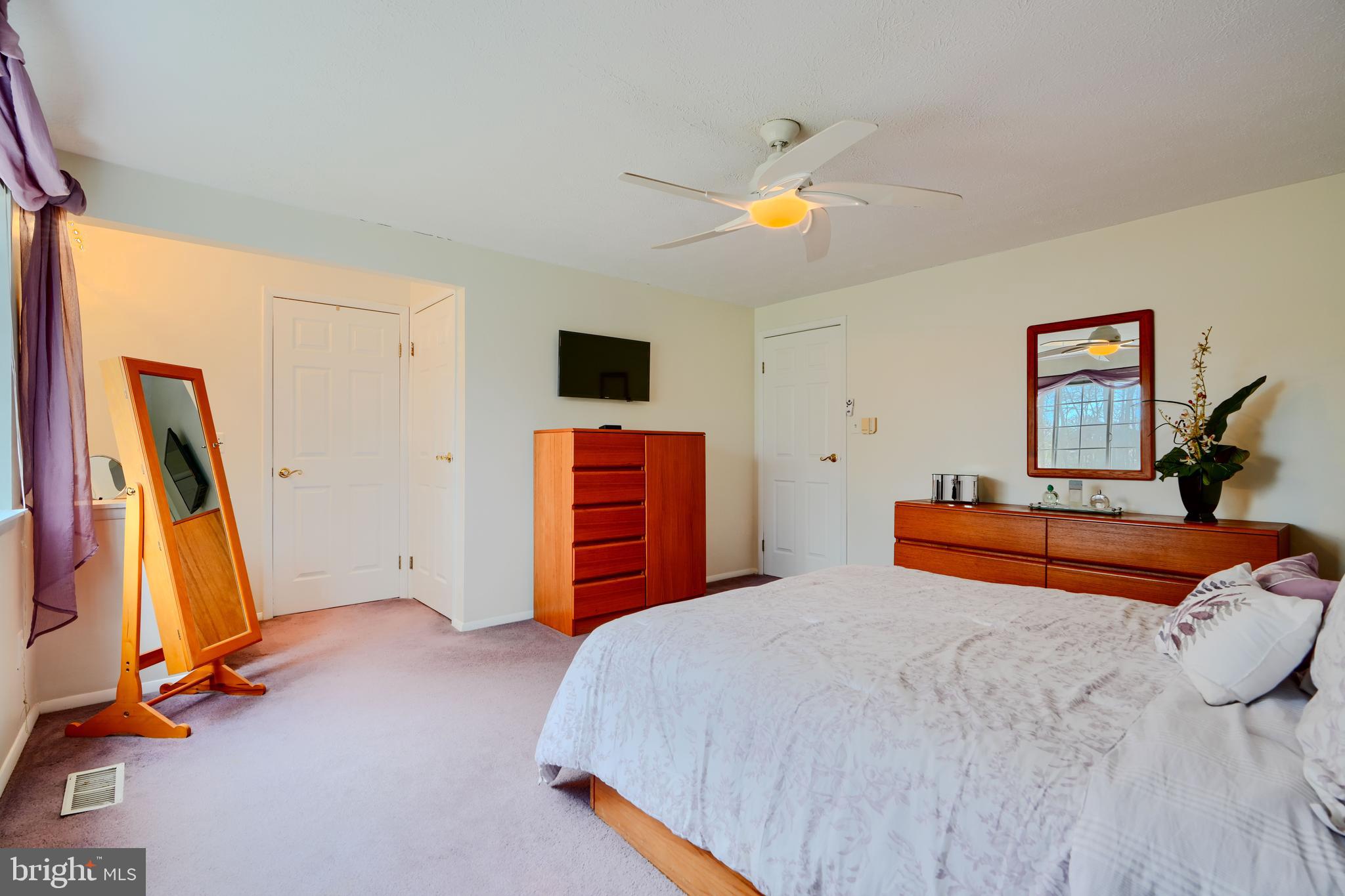 19 Yew Road Baltimore, MD 21221 - Photo 26 of 36 a bedroom with bed and wooden floor