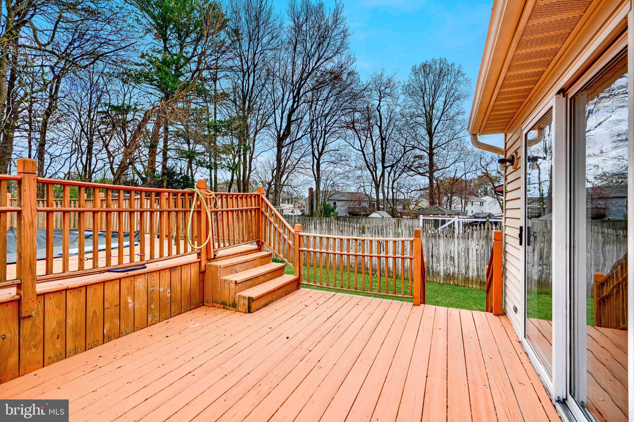 19 Yew Road Baltimore, MD 21221 - Photo 3 of 36 a balcony with trees in front of it