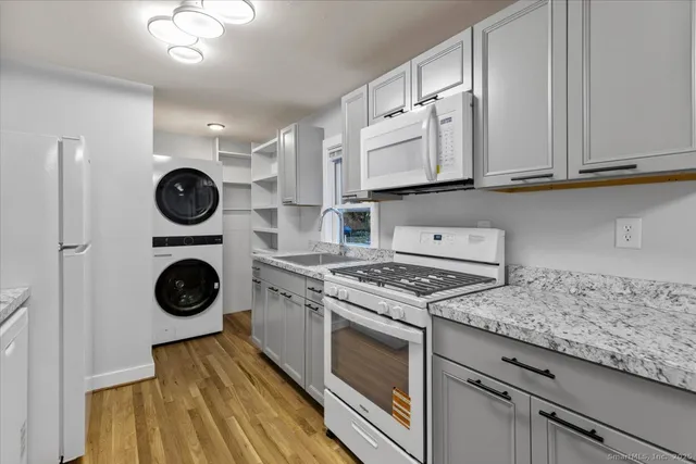 a view of cabinets and wooden floor