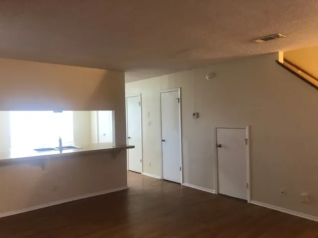 a view of a kitchen with a sink and dishwasher