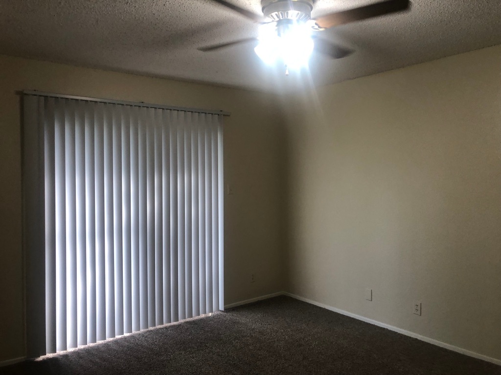 3308 Dunliegh Drive, Unit A Austin, TX 78745 - Photo 6 of 10 a view of an empty room with wooden floor