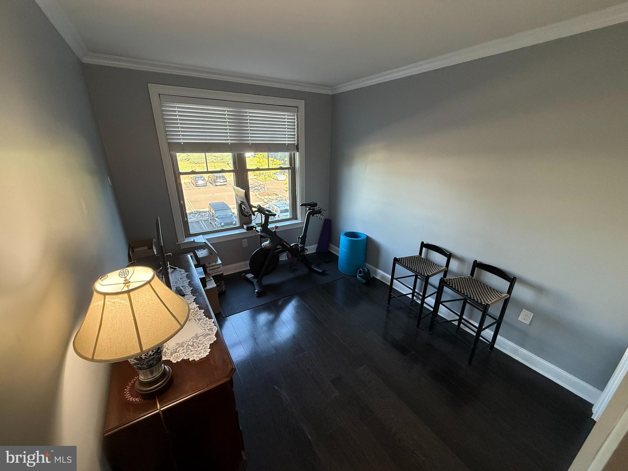 200 North Sycamore Street, Unit 2I Newtown, PA 18940 - Photo 17 of 27 a living room with furniture and a table