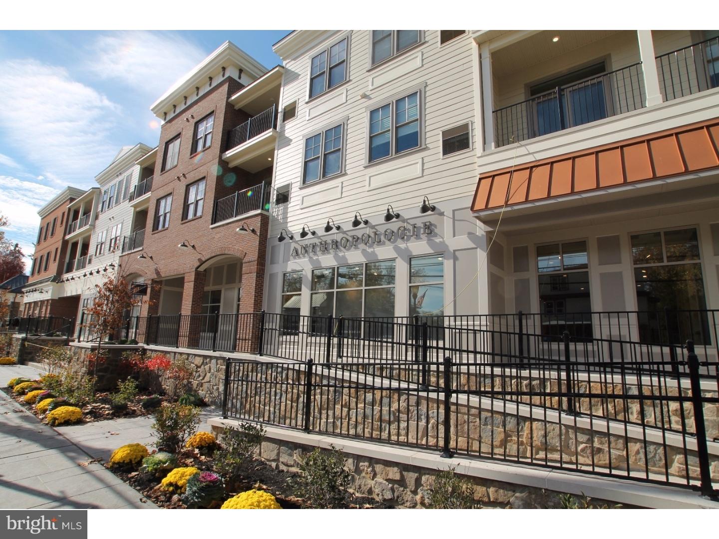 200 North Sycamore Street, Unit 2I Newtown, PA 18940 - Photo 24 of 27 a view of a brick building with many windows