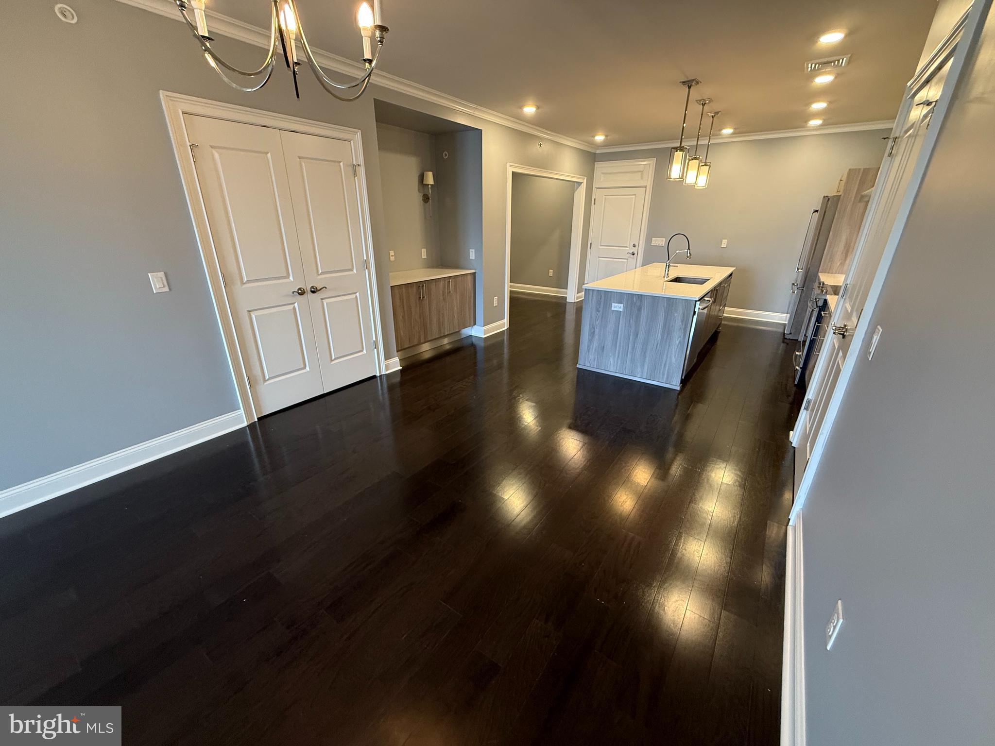 200 North Sycamore Street, Unit 2I Newtown, PA 18940 - Photo 4 of 27 a view of a hallway with wooden floor