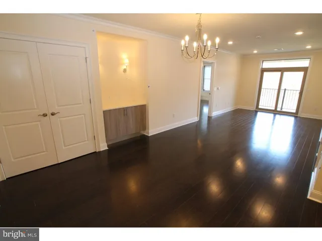 a view of livingroom with hardwood floor and window