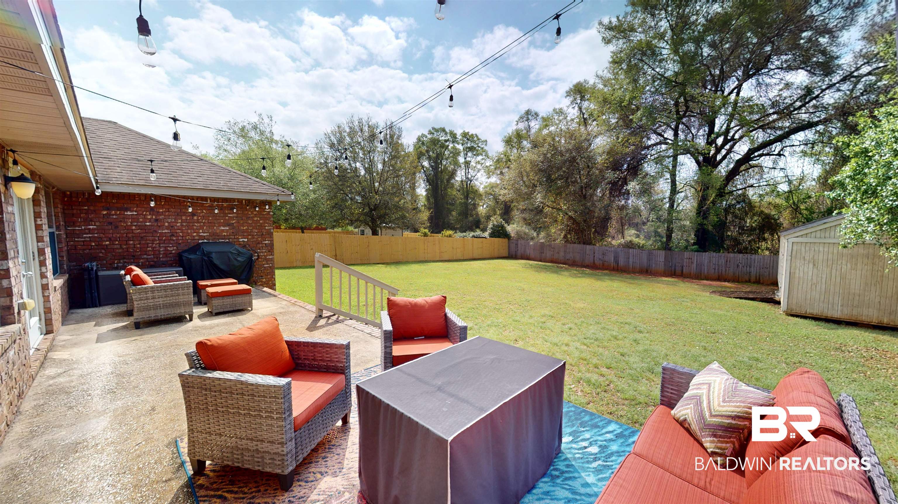 10753 Rigby Drive Mobile, AL 36695 - Photo 23 of 33 Raised concrete deck will provide countless hours of outdoor entertaining! The new outdoor furniture and gas grill will convey with an acceptable Offer!