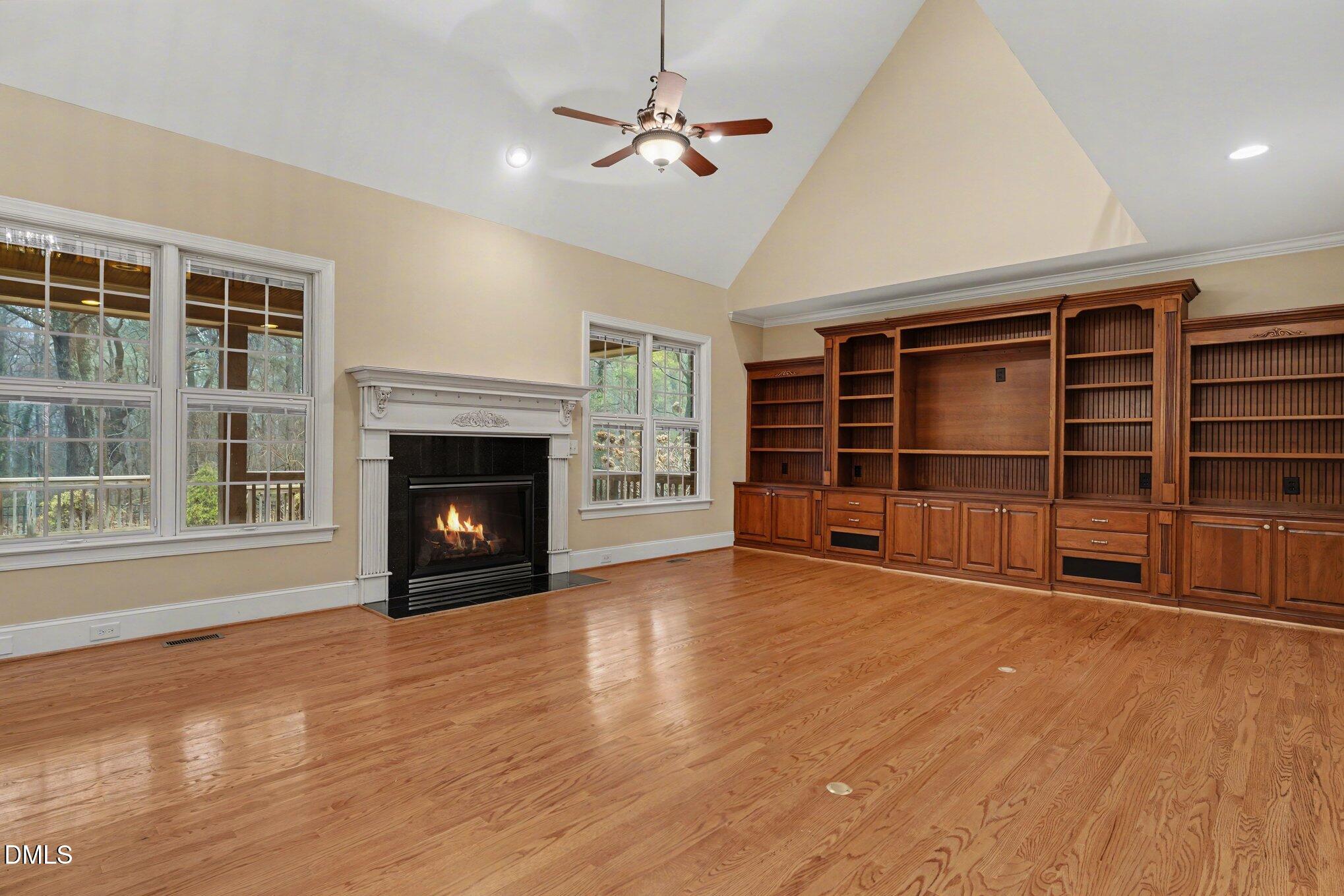 3104 Lake Wheeler Road Raleigh, NC 27603 - Photo 17 of 74 a view of an empty room with a fireplace and a window