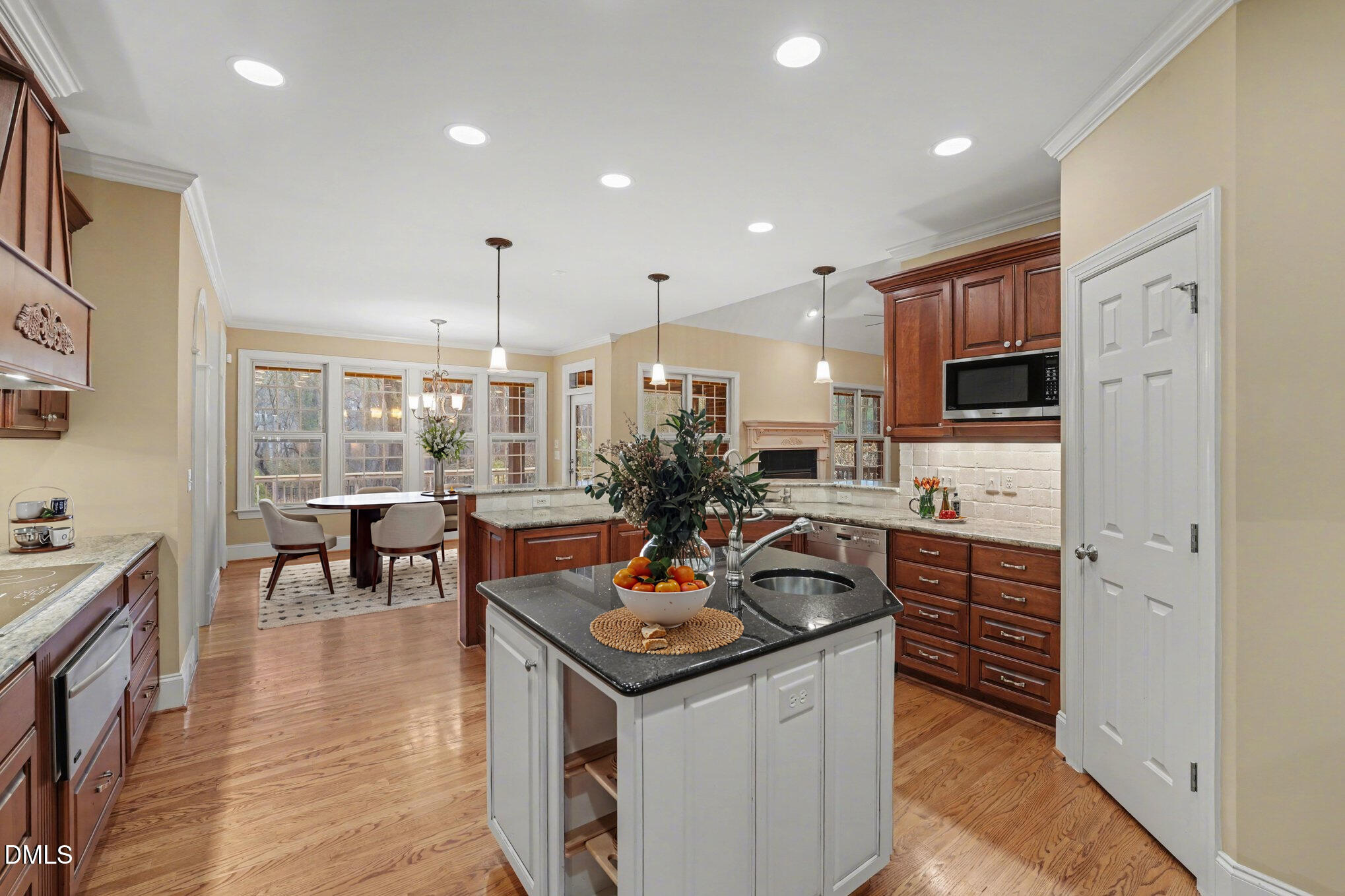 3104 Lake Wheeler Road Raleigh, NC 27603 - Photo 22 of 74 a kitchen that has a lot of cabinets a sink and appliances in it