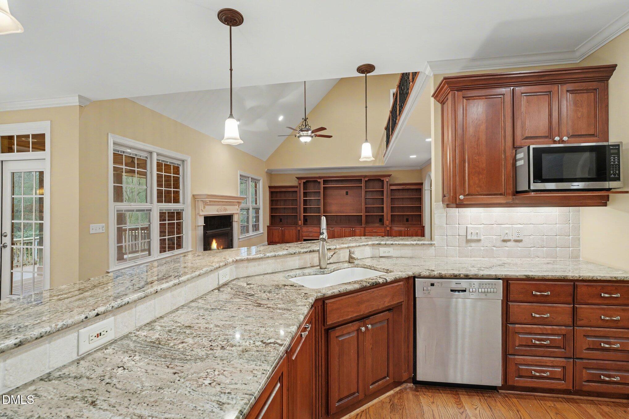 3104 Lake Wheeler Road Raleigh, NC 27603 - Photo 23 of 74 a kitchen with a sink stove and microwave