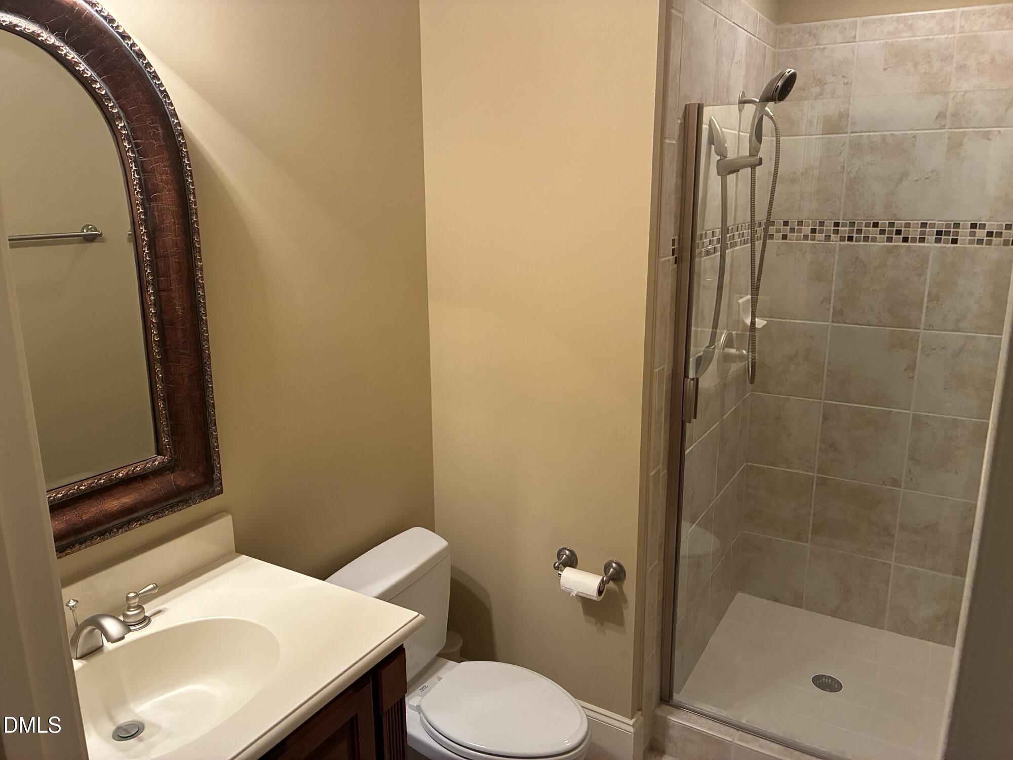 3104 Lake Wheeler Road Raleigh, NC 27603 - Photo 29 of 74 a bathroom with a sink toilet and shower