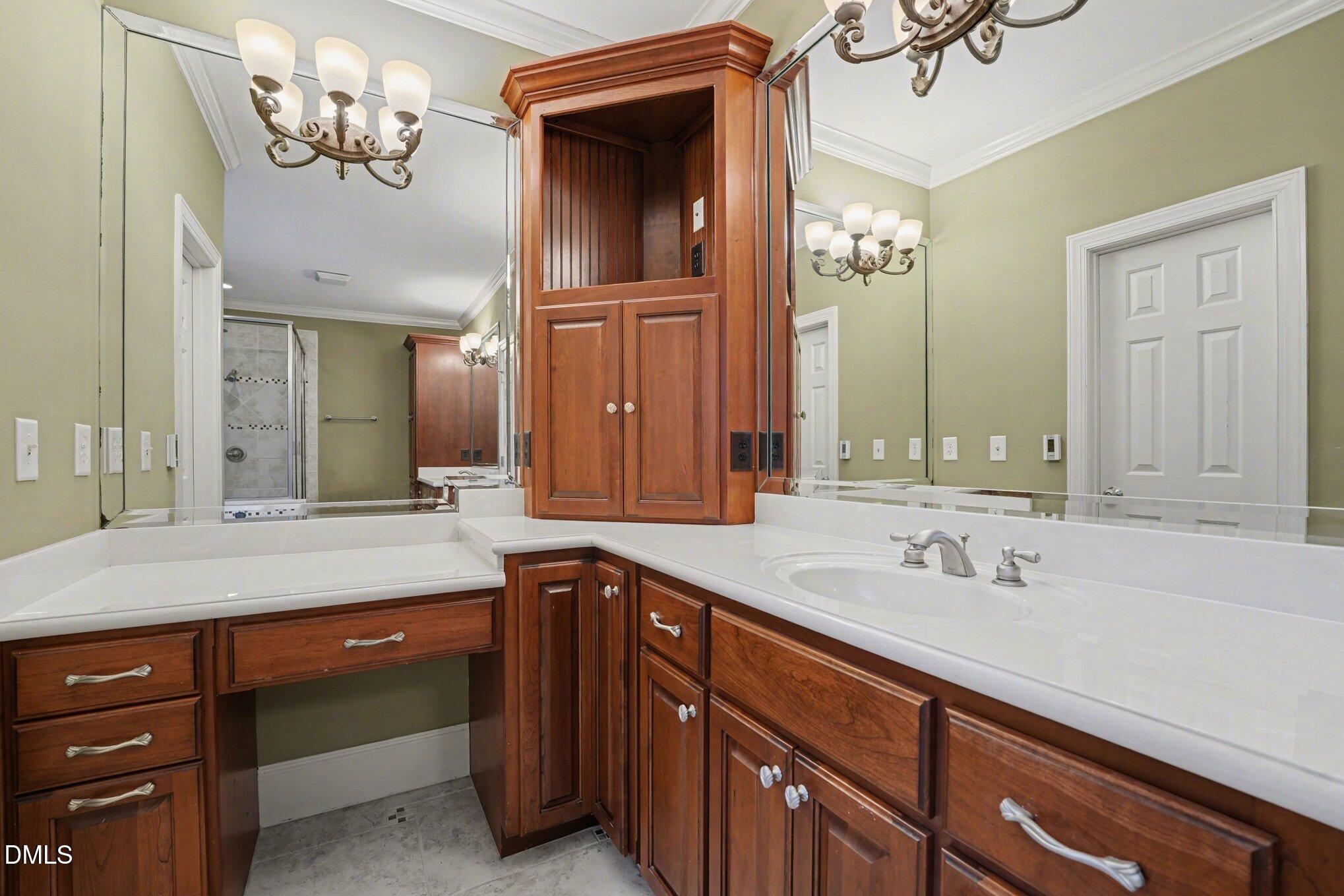 3104 Lake Wheeler Road Raleigh, NC 27603 - Photo 41 of 74 a bathroom with a sink double vanity and a mirror