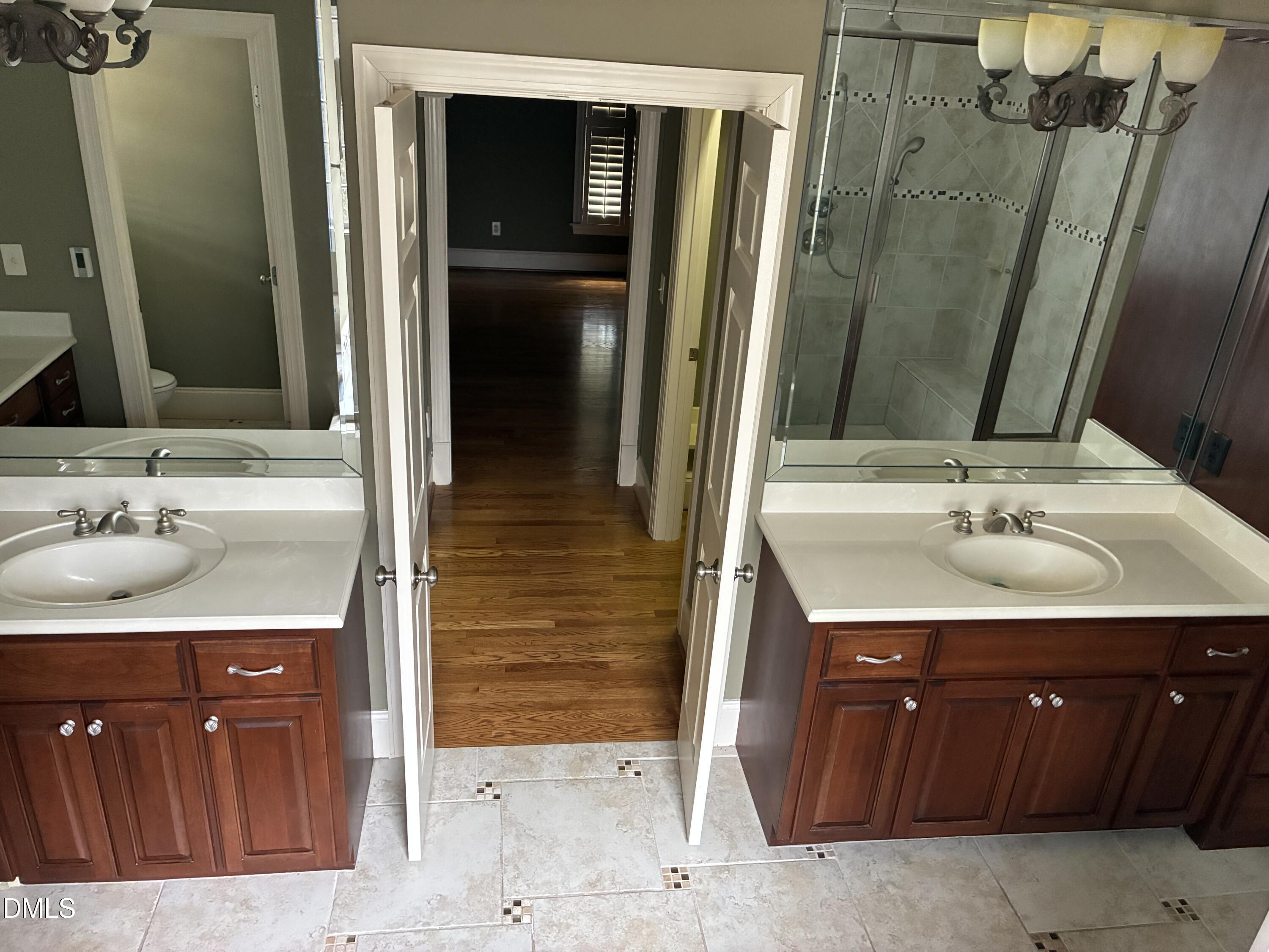 3104 Lake Wheeler Road Raleigh, NC 27603 - Photo 46 of 74 a bathroom with a sink and a mirror