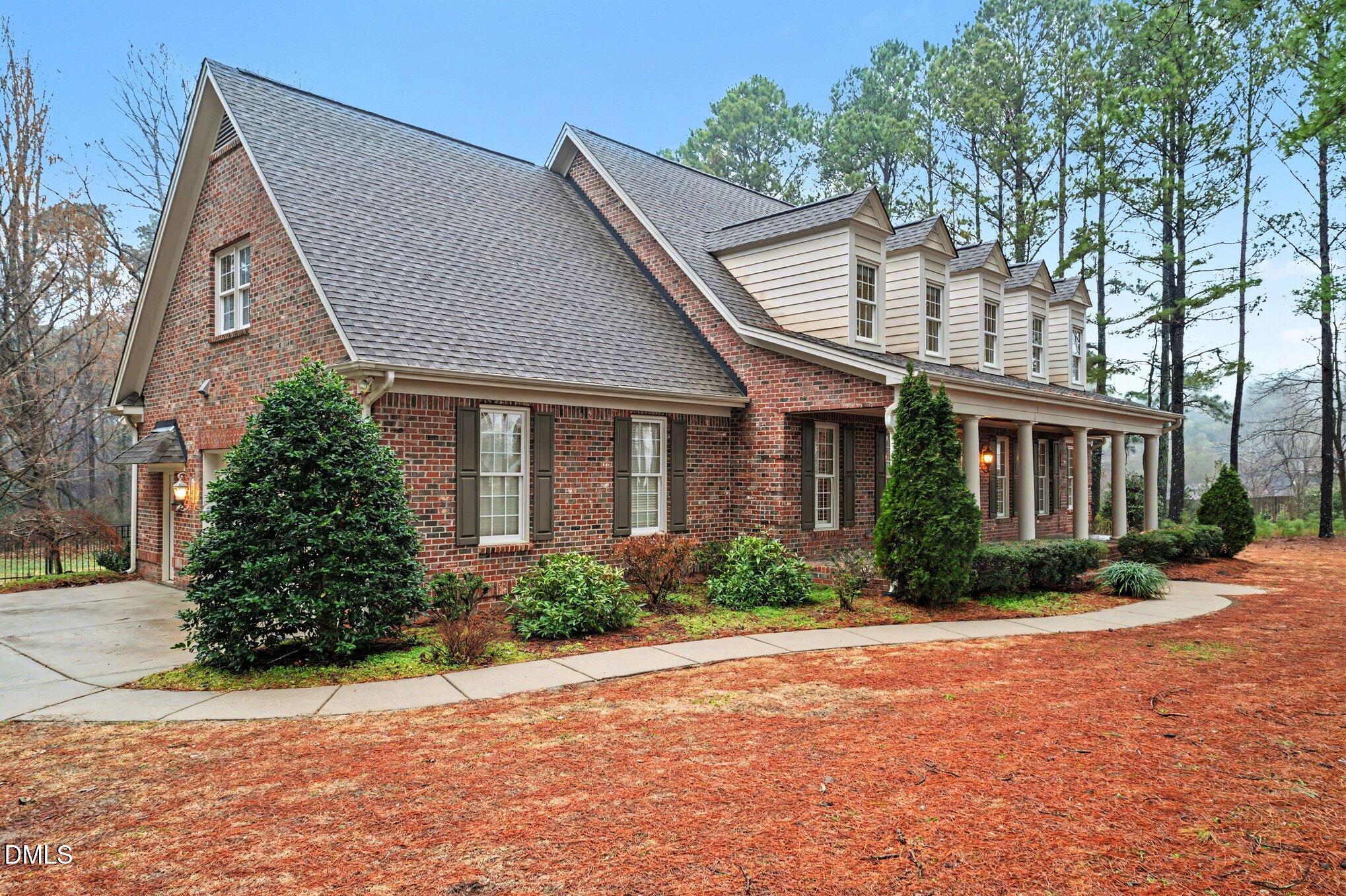 3104 Lake Wheeler Road Raleigh, NC 27603 - Photo 3 of 74 a front view of a house with a yard