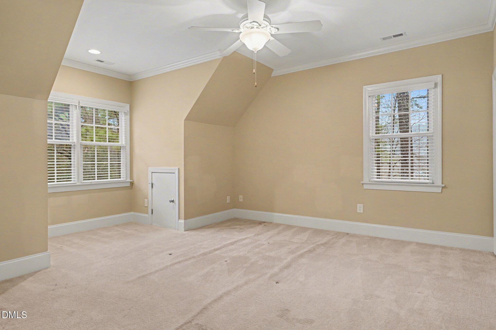 3104 Lake Wheeler Road Raleigh, NC 27603 - Photo 50 of 74 an empty room with windows and fan