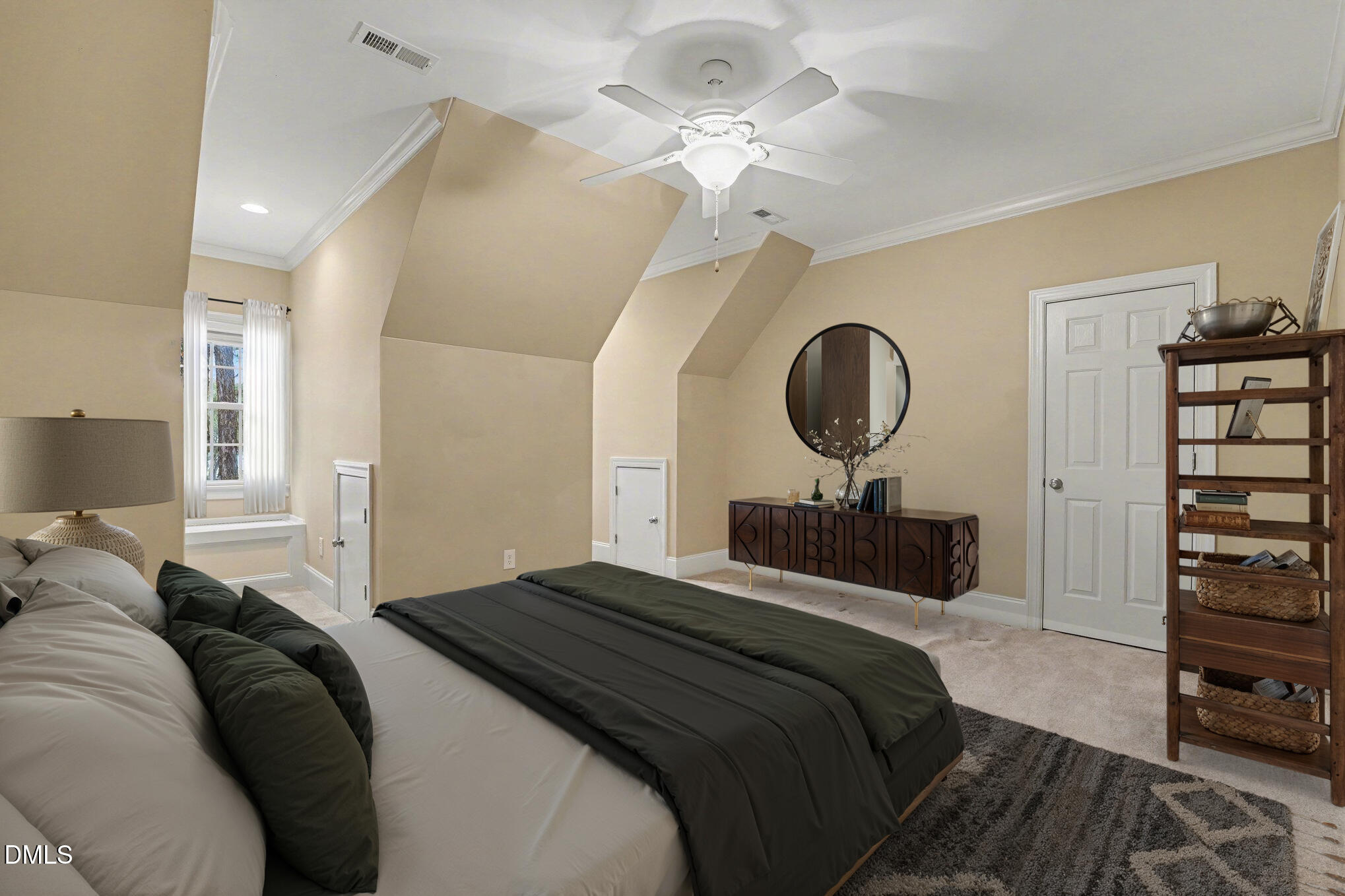 3104 Lake Wheeler Road Raleigh, NC 27603 - Photo 51 of 74 a bedroom with a bed and a chandelier