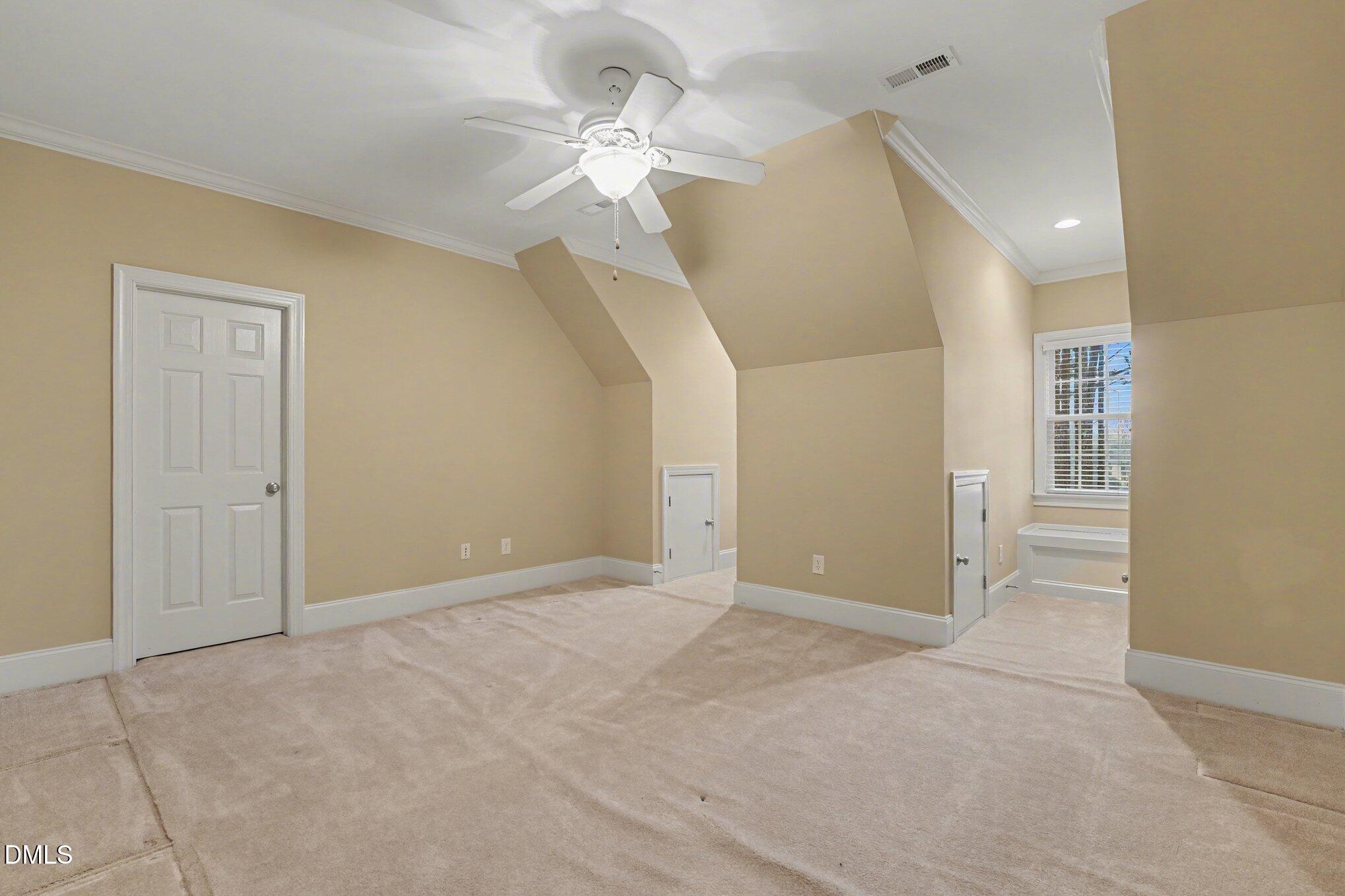3104 Lake Wheeler Road Raleigh, NC 27603 - Photo 54 of 74 an empty room with fan and entrance
