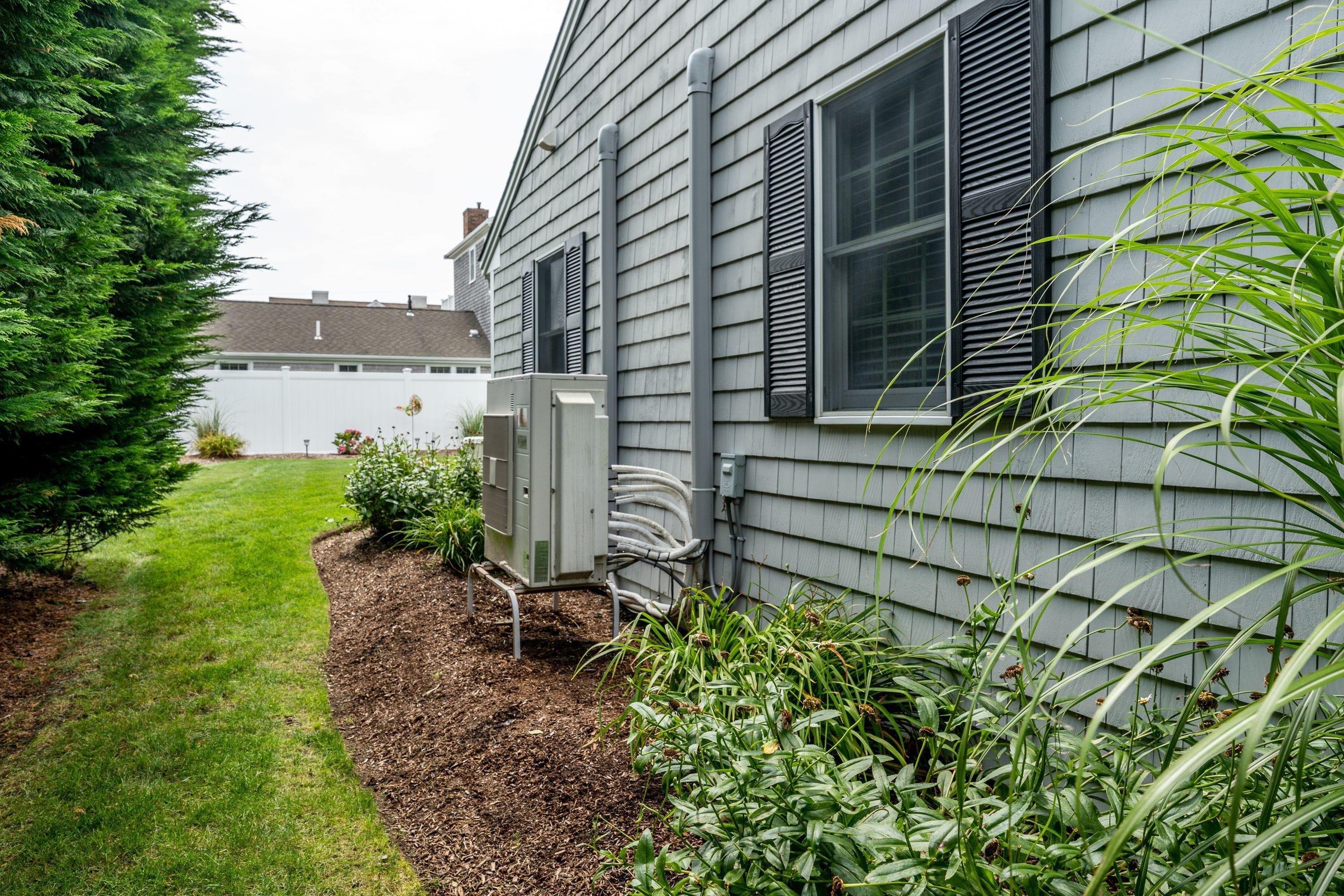 85 Surfside Road West Dennis, MA 02670 - Photo 31 of 34 a house with a yard