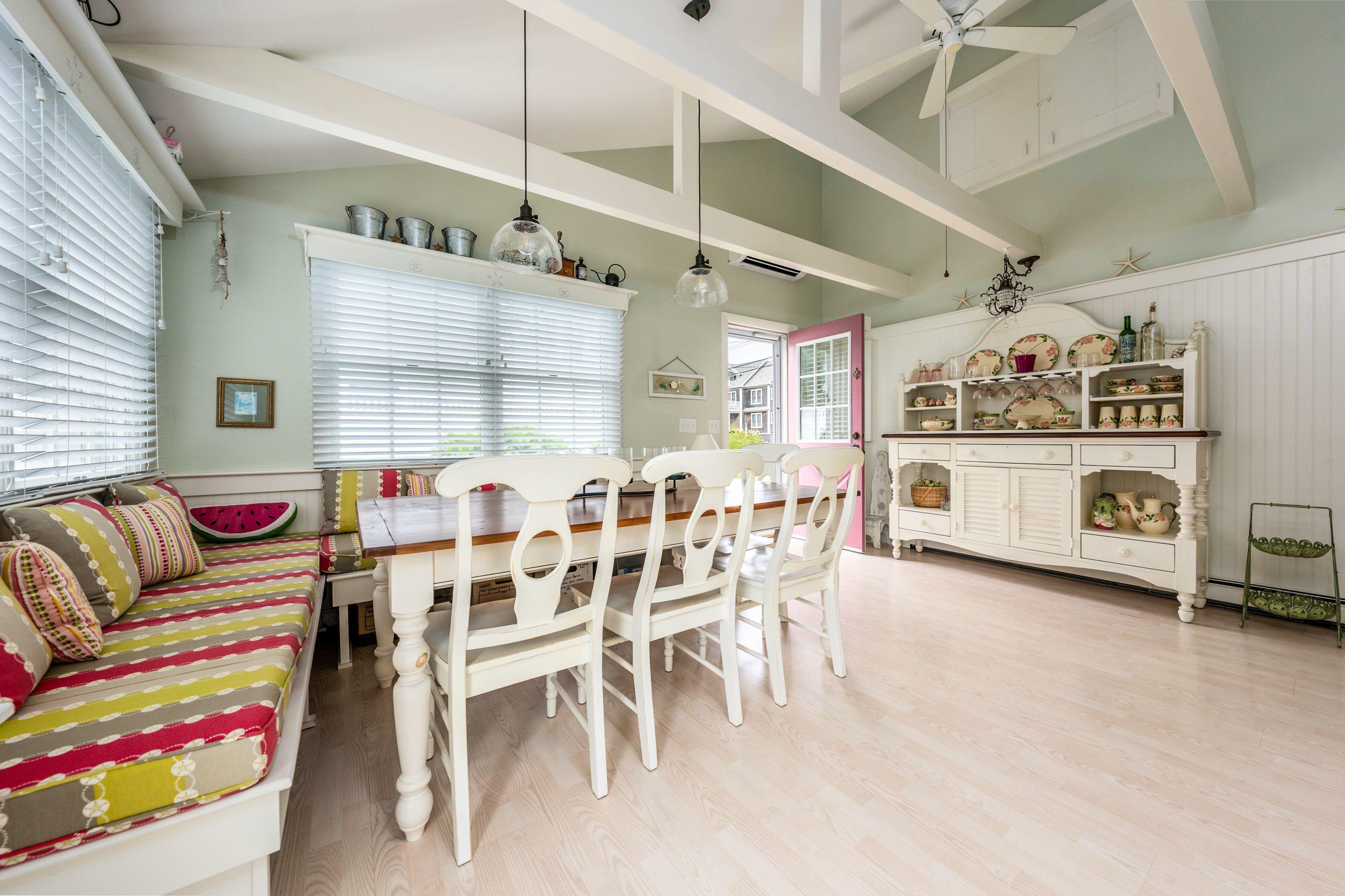 85 Surfside Road West Dennis, MA 02670 - Photo 6 of 34 a living room with furniture and a table