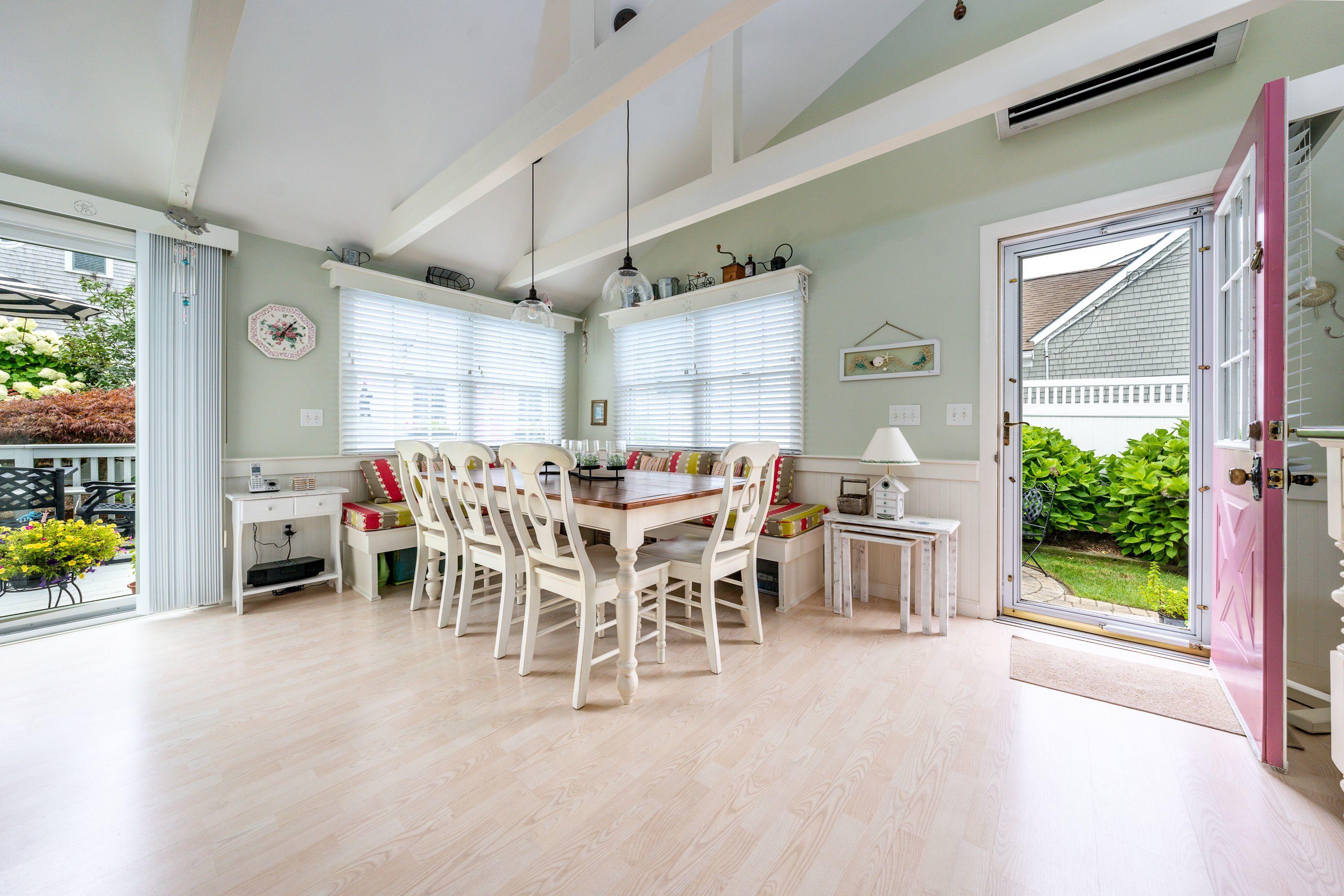 85 Surfside Road West Dennis, MA 02670 - Photo 7 of 34 a view of a dining room with furniture