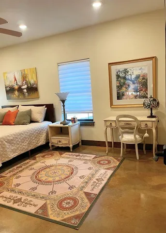 a living room with furniture and a rug
