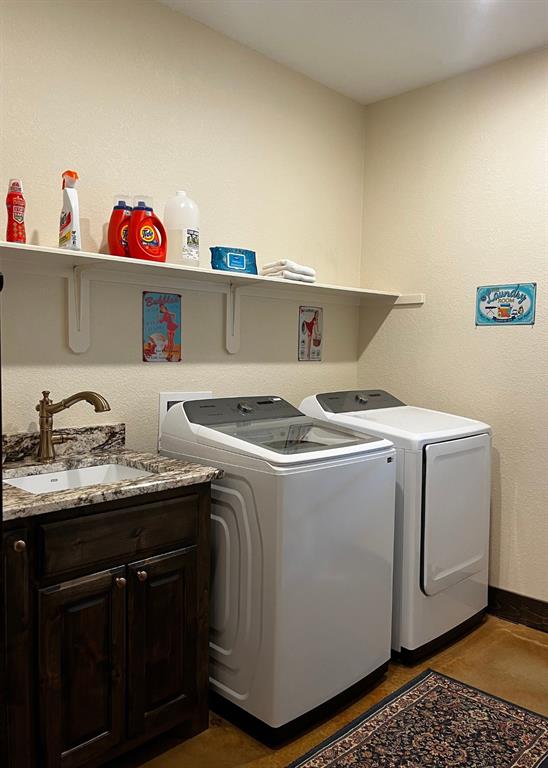6601 Rash Court Granbury, TX 76049 - Photo 21 of 23 a utility room with dryer and washer