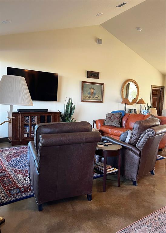 6601 Rash Court Granbury, TX 76049 - Photo 5 of 23 a living room with furniture and a flat screen tv