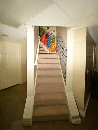 a view of an empty room with painted walls