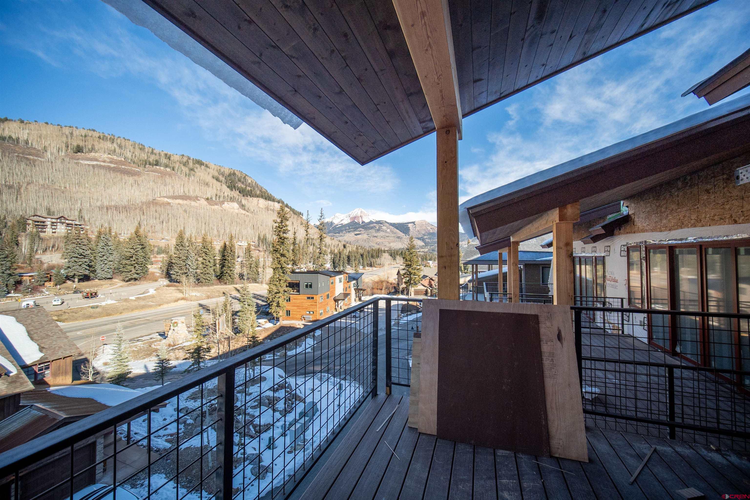 93 Travertine Trail Durango, CO 81301 - Photo 16 of 23 a view of a balcony with wooden floor