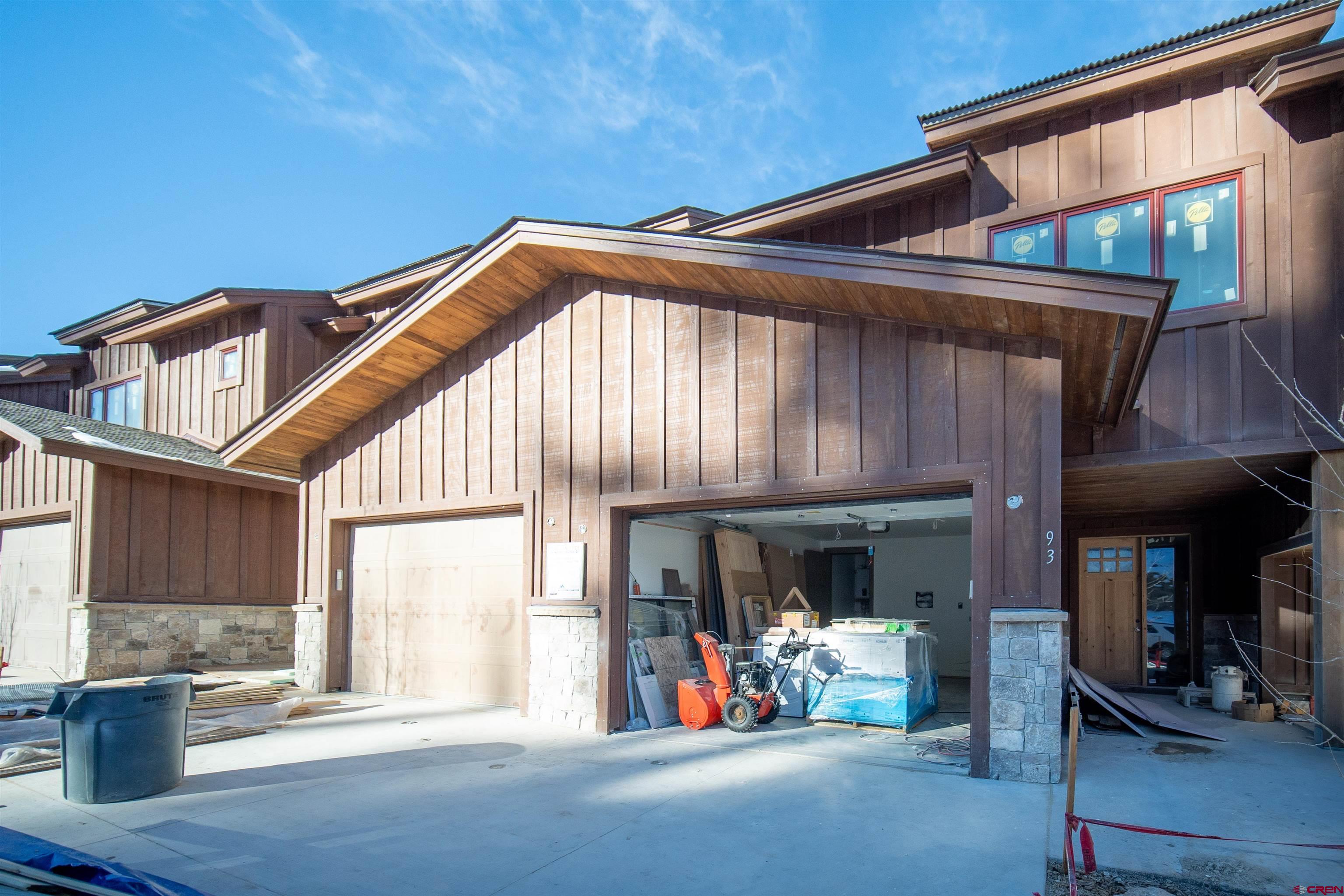 93 Travertine Trail Durango, CO 81301 - Photo 18 of 23 a front view of a house with outdoor seating