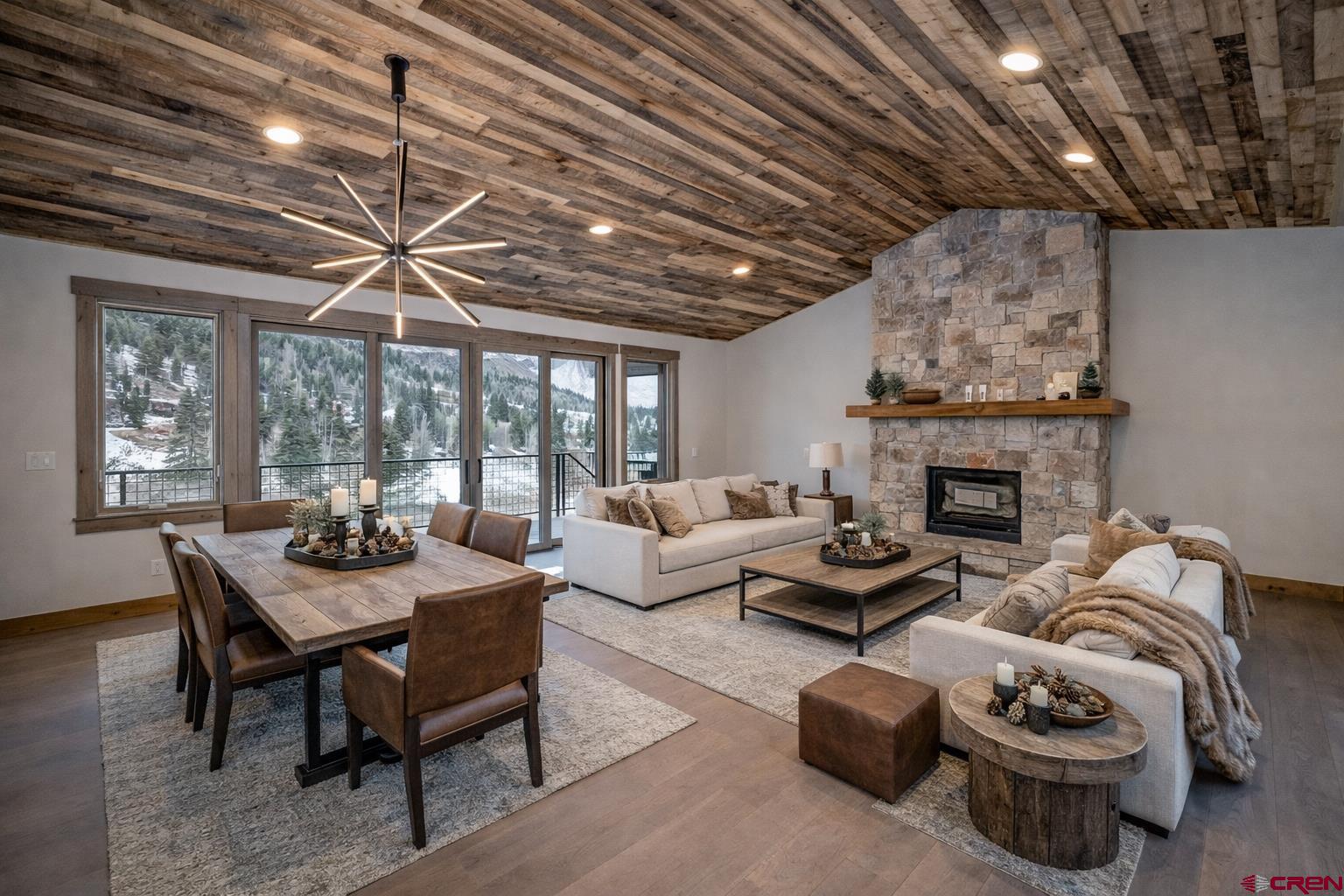 93 Travertine Trail Durango, CO 81301 - Photo 26 of 44 a living room with furniture and a fireplace