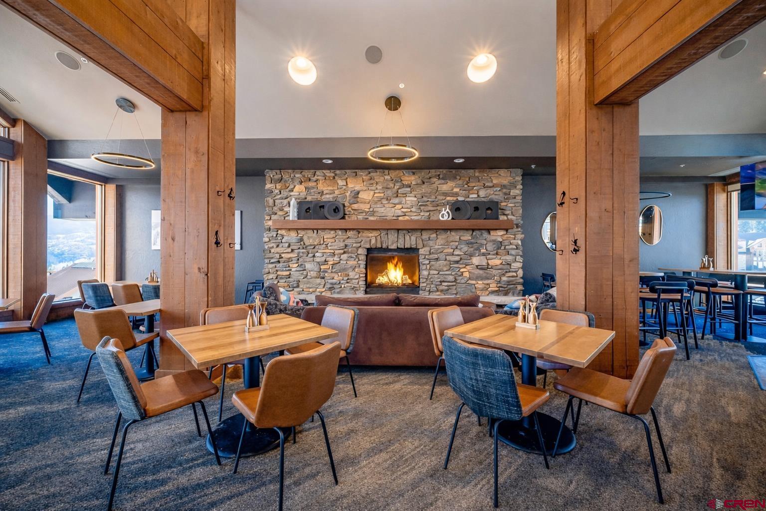 93 Travertine Trail Durango, CO 81301 - Photo 36 of 44 a dining room with a table and chairs