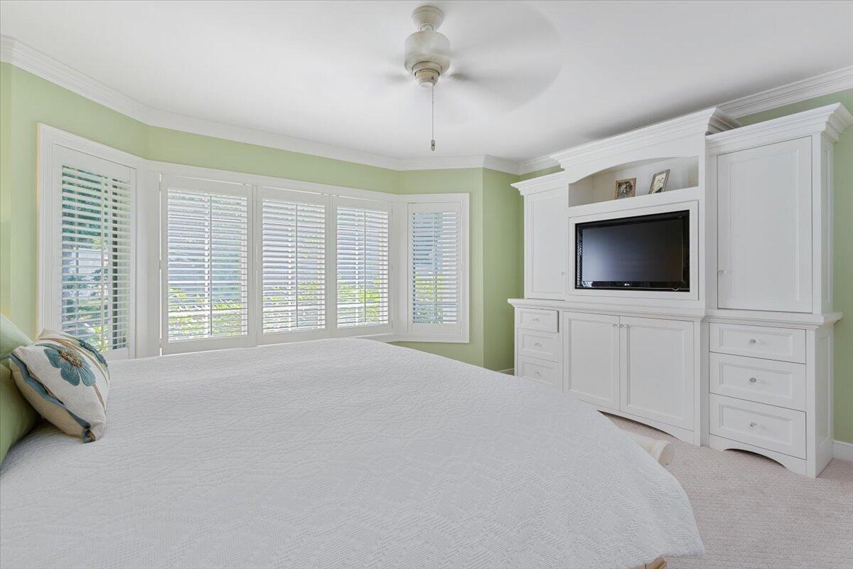1490 South County Road Osterville, MA 02655 - Photo 25 of 75 a living room with furniture and a flat screen tv