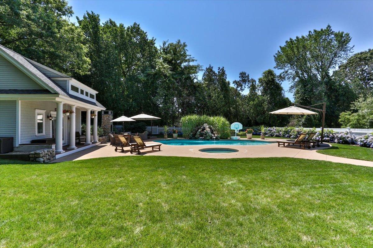 1490 South County Road Osterville, MA 02655 - Photo 46 of 75 a view of a house with swimming pool and sitting area