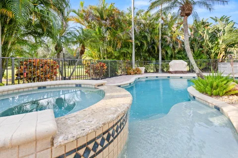 a view of a lake with a yard