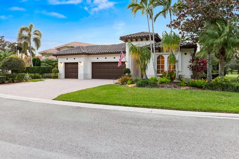 a living room with furniture a rug and a large window