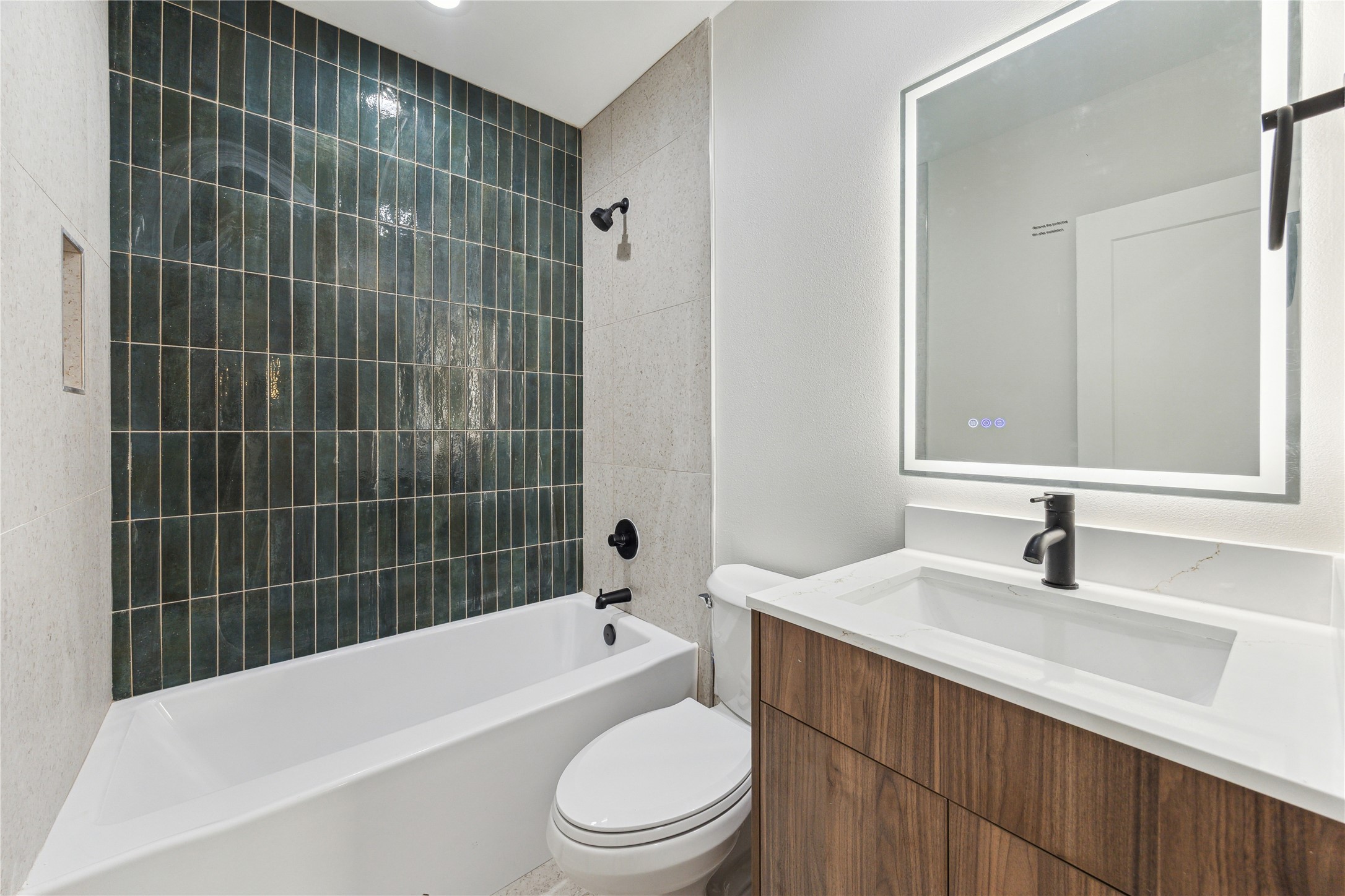 3902 Zina Way Houston, TX 77018 - Photo 21 of 48 a bathroom with a sink a toilet and bathtub