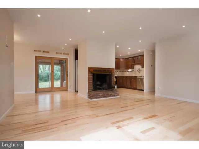 a view of a livingroom with a fireplace