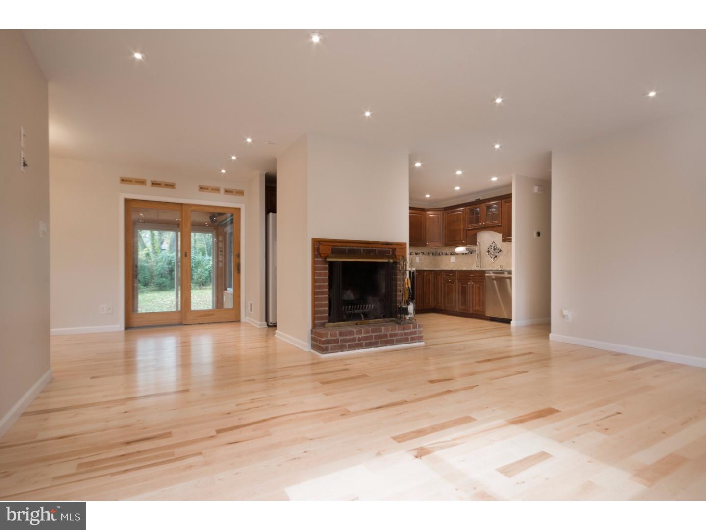 a view of a livingroom with a fireplace