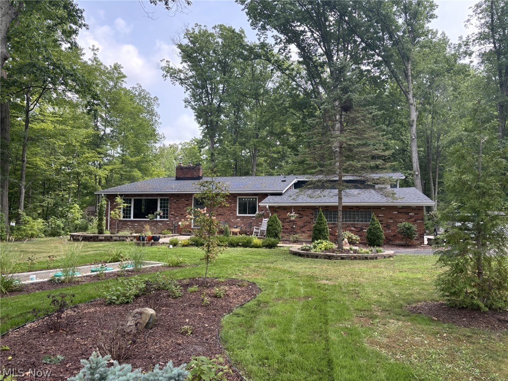 This home sits on a wooded, secluded acre.