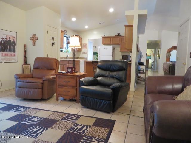 963 Calle Amarillo Rio Rico, AZ 85648 - Photo 26 of 31 a living room with furniture and a rug