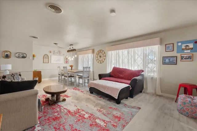 a living room with furniture and a couch