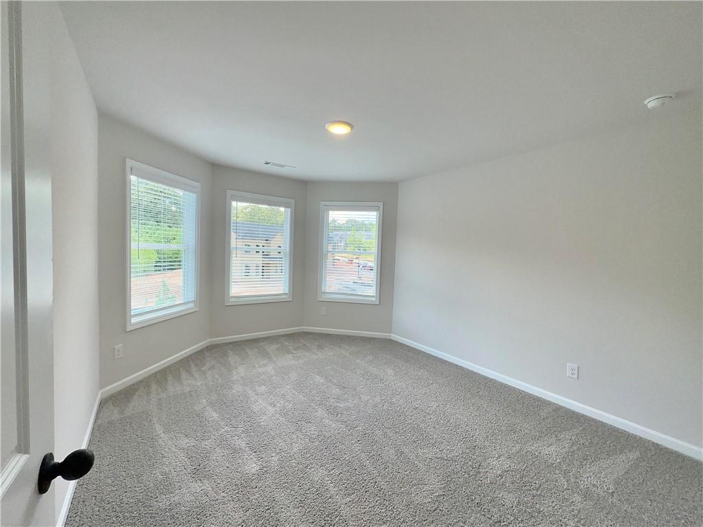 2226 Sun Valley Buford, GA 30519 - Photo 18 of 22 an empty room with windows