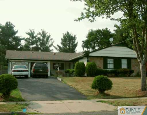 115 Drake Road Somerset, NJ 08873 - Photo 1 of 1 a front view of a house with a yard