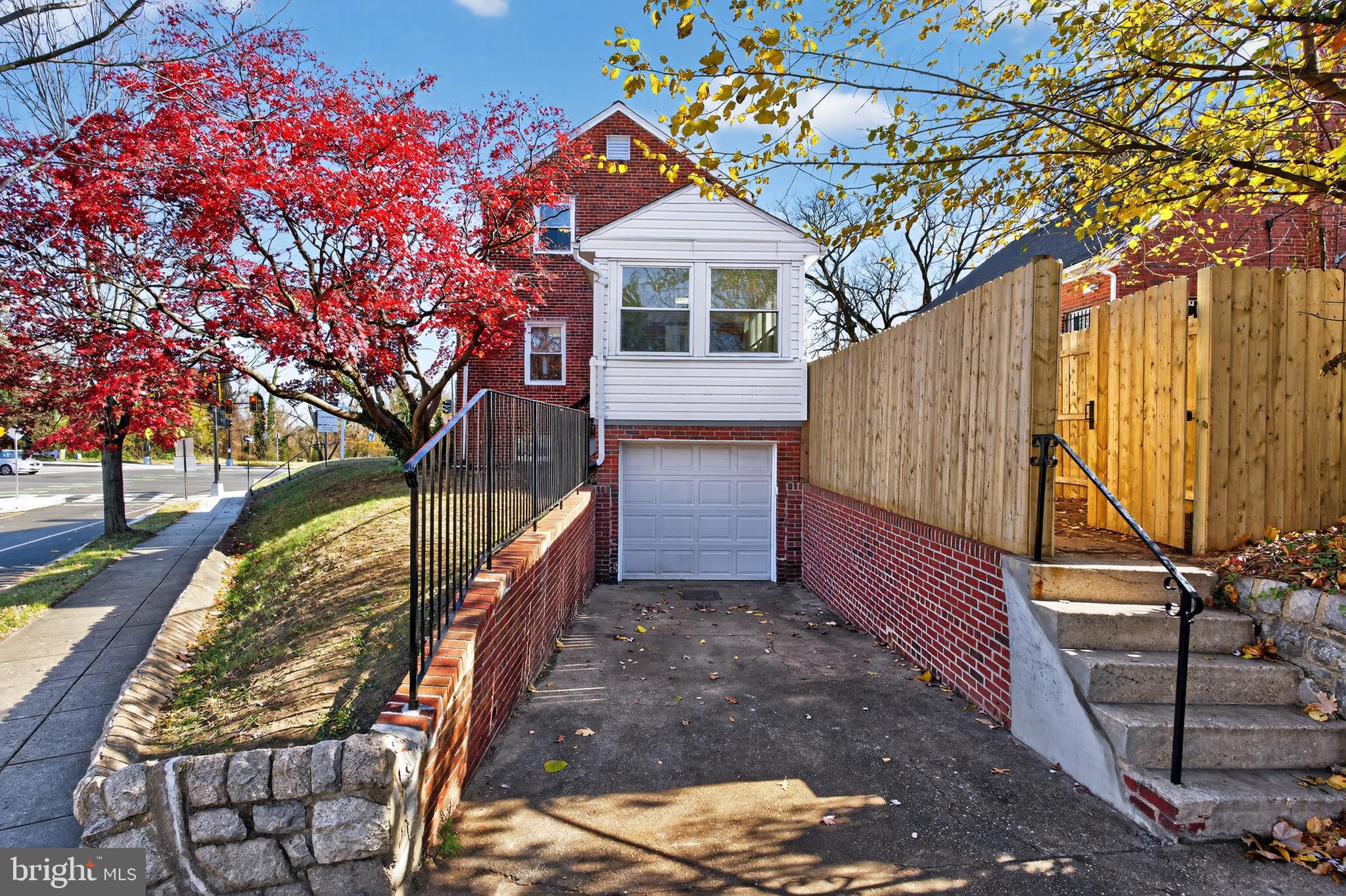 31 McDonald Place Northeast Washington, DC 20011 - Photo 40 of 45 a front view of a house with a yard