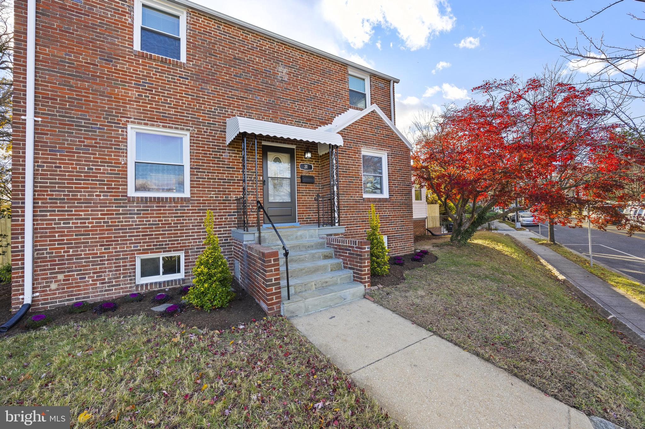 31 McDonald Place Northeast Washington, DC 20011 - Photo 44 of 45 a front view of a house with garden